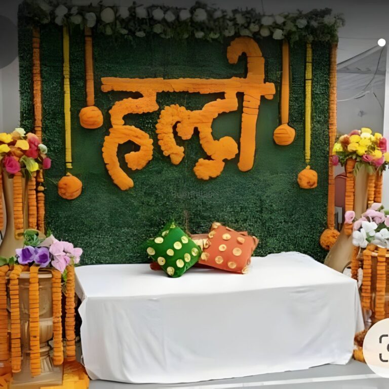 Green Wall Haldi Backdrop with Floral Styling