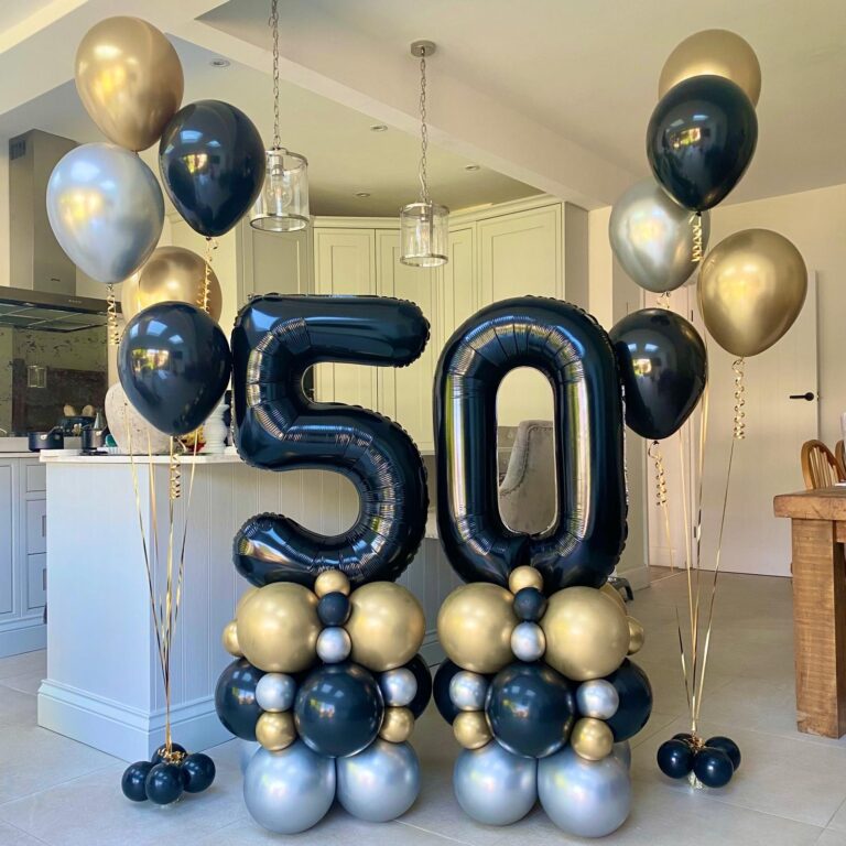 Black, Gold and Silver 50th Birthday Balloon Number Columns with Matching Helium Balloon Bouquets for a special celebration.