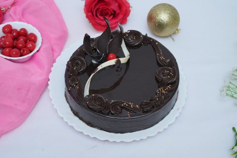 Truffle Cake – Decadent chocolate sponge layered with silky dark chocolate truffle ganache.