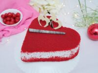 Red Velvet Heart – Smooth red velvet cake with creamy cheese frosting in a romantic heart shape.