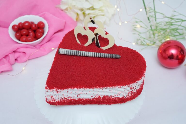 Red Velvet Heart – Smooth red velvet cake with creamy cheese frosting in a romantic heart shape.