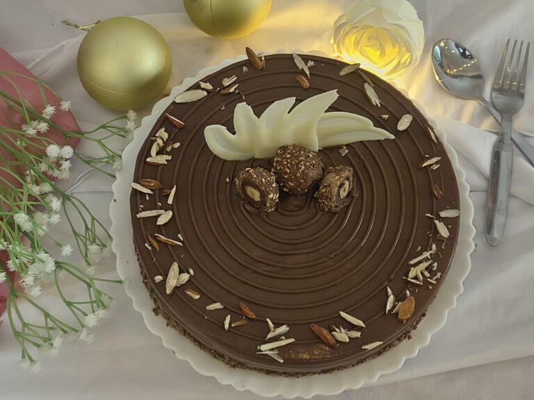 Ferrero Rocher – Luxurious chocolate cake inspired by Ferrero Rocher with hazelnut crunch.