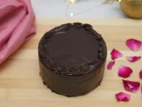 Dark chocolate bliss, rich layers you can't resist. Truffle Bento – Decadent chocolate sponge layered with silky dark chocolate truffle ganache 280-300gms