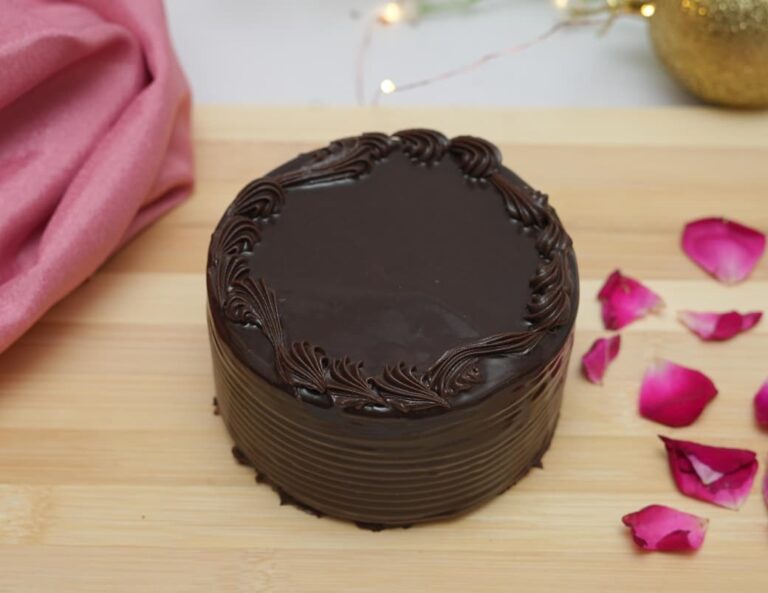 Dark chocolate bliss, rich layers you can’t resist. Truffle Bento – Decadent chocolate sponge layered with silky dark chocolate truffle ganache 280-300gms