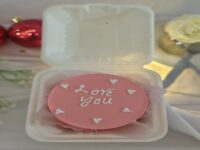 Strawberry 300 grams and eggless Bento. A dessert made with strawberries, resulting in a moist, tender cake with a fruity flavor. It can be made with fresh strawberries mixed into the batter, used as a filling, or appear in the form of a glaze or frosting 280-300gms