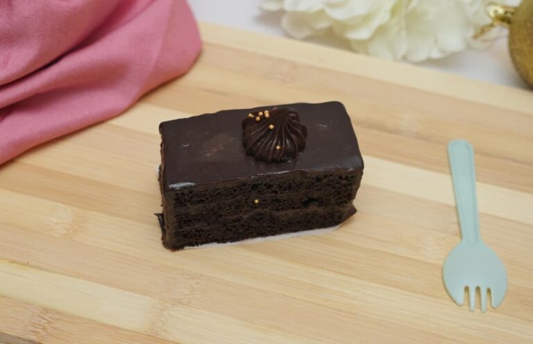 Truffle Pastry Chocolate sponge layered with rich truffle cream 80-100gms