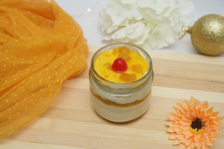 Pineapple Jar Cake – Soft vanilla sponge  layered with fresh pineapple compote and light whipped cream served in a lovely attractive cute jar