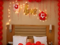 Romantic Bedside Balloon Decoration with Golden Love Foil & Lights