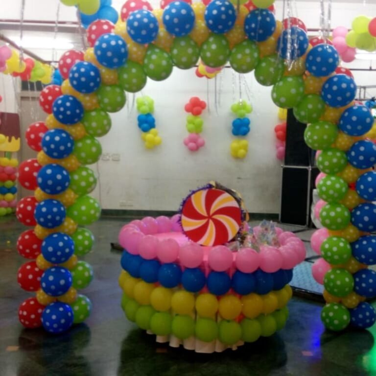 Birthday Cake Table Decoration with Rainbow Balloon Arch